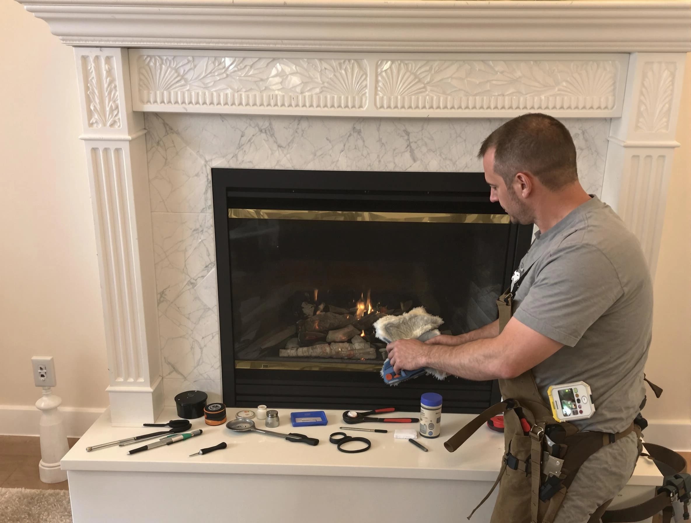 Plain City Chimney Sweep performing fireplace maintenance in Plain City, UT